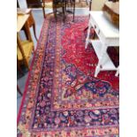 A PERSIAN TABRIZ CARPET. 390 x 305cms.