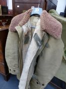 A VINTAGE MALSAKRAD FALO SWEDISH MILITARY SHEEPSKIN LINED COAT.