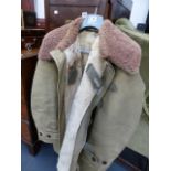 A VINTAGE MALSAKRAD FALO SWEDISH MILITARY SHEEPSKIN LINED COAT.