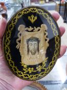 AN UNUSUAL CONTINENTAL ANTIQUE OVAL ICON OR RELIQUARY WITH CENTRAL PORTRAIT OF CHRIST WITH SCROLL