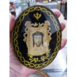 AN UNUSUAL CONTINENTAL ANTIQUE OVAL ICON OR RELIQUARY WITH CENTRAL PORTRAIT OF CHRIST WITH SCROLL