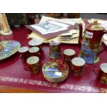 A WILTON WARE ORIENTALIST DECORATED PART TEA SET WITH GILT HIGHLIGHTS ON A CRANBERRY GROUND.