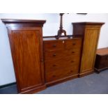 AN EARLY 19th.C.MAHOGANY LINEN PRESS WITH TWO SHORT AND THREE LONG DRAWERS FLANKED BY UPRIGHT
