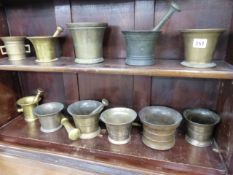 A GROUP OF ELEVEN 17th AND 18th.C.BRONZE MORTAR AND SIX PESTLES. (17)