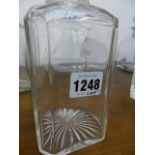 A COLLECTION OF CLEAR GLASS DECANTERS AND STOPPERS, SOME WITH CUT OR MOULDED DECORATION AND ONE WITH