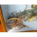 A VINTAGE FOLK ART RUSTIC MODEL OF A HORSE DRAWN PLOUGH IN A GLAZED CASE TOGETHER WITH AN ASSOCIATED