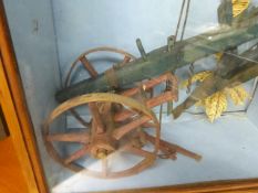 A VINTAGE FOLK ART RUSTIC MODEL OF A HORSE DRAWN PLOUGH IN A GLAZED CASE TOGETHER WITH AN ASSOCIATED