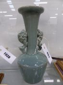 A KOREAN GREEN/GREY CRACKLE GLAZE VASE WITH STYLISED FISH FORM HANDLES.