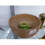 AN EARLY RED STONEWARE DEEP BOWL AND AN EASTERN GREEN GLAZED POTTERY OIL LAMP