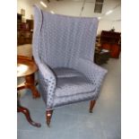 A 19th.C.BARREL BACK HALL PORTER'S WING ARMCHAIR.