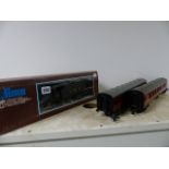 A LIMA O GAUGE BOXED LOCOMOTIVE AND TENDER TOGETHER WITH TWO CARRIAGES IN LMS LIVERY AND A SMALL