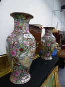 A PAIR OF CANTONESE STYLE BALUSTER FORM VASES. H.45cms.