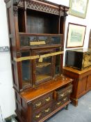 A LARGE 19th.C.OAK AND GLAZED CABINET ON A CARVED FOUR DRAWER BASE. W.112 x H.220cms.