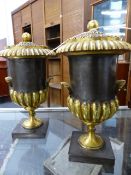 A PAIR OF EARLY 19th.C.STEEL AND ORMOLU MOUNTED LIDDED URNS WITH SHELL HANDLES, POSSIBLY RUSSIAN.