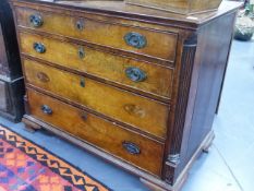 A GEORGIAN MAHOGANY BATCHELOR'S CHEST OF FOUR DRAWERS THE UPPER DRAWER WITH VARIOUS COMPARTMENTS,