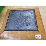 AN ANTIQUE BRONZED PLAQUE OF AN EQUESTRIAN MOUNTED ROYAL FIGURE IN A CITY SQUARE, IN MAPLE FRAME. 19