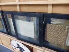 A SET OF FRAMED VINTAGE TEXTILE SAMPLES.