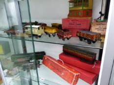 THREE HORNBY CLOCKWORK LOCOMOTIVES, VARIOUS ROLLING STOCK, GOODS WAGONS, SIGNAL BOX,ETC.