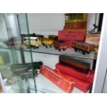 THREE HORNBY CLOCKWORK LOCOMOTIVES, VARIOUS ROLLING STOCK, GOODS WAGONS, SIGNAL BOX,ETC.