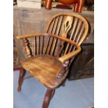 A 19th.C.ASH AND ELM WINDSOR ARMCHAIR.