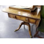 A REGNECY MAHOGANY AND ROSEWOOD CROSSBANDED PEMBROKE LIBRARY TABLE ON SHAPED SABRE LEGS, THE TOP 101