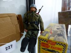 AN ACTION MAN IN GERMAN UNIFORM WITH IRIGINAL 1973 PALITOY POSTAGE PACK TOGETHER WITH AND AIRFIX