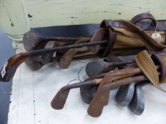 A LARGE QUANTITY OF WOOD SHAFTED AND OTHER GOLF CLUBS.