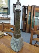 A CORNISH POLISHED STONE LIGHTHOUSE FORM TABLE LIGHTER OF UNUSUALLY LARGE SIZE. OVERALL H.58cms.