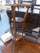 AN EDWARDIAN OAK AND INLAID RING TOP WASHSTAND.