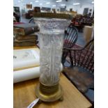 AN ORMOLU MOUNTED CUT CRYSTAL CYLINDER FORM VASE WITH IMPRESSED MARKS TO BASE. H.38cms.