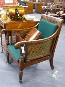 A 19th.C.MAHOGANY BERGERE LIBRARY ARMCHAIR.