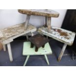 A GROUP OF FIVE RUSTIC FOOTSTOOLS.