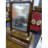 AN ANTIQUE WALNUT AND INLAID DRESSING TABLE MIRROR WITH A SHAPED DRAWER BASE. W.47cms.