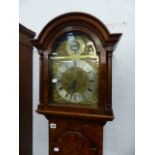 A 20th.C.WALNUT CASED LONGCASE CLOCK WITH ARCH BRASS DIAL SIGNED GARRARD, SILVER CHAPTER RING AND