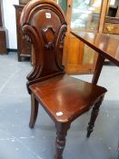 A VICTORIAN MAHOGANY HALL CHAIR.