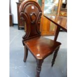 A VICTORIAN MAHOGANY HALL CHAIR.