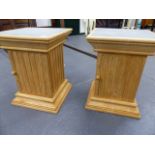 A PAIR OF HARDWOOD PEDESTAL CABINETS.