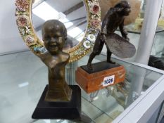 AN EARLY 20th.C.FRENCH BRONZE BUST OF A LAUGHING CHILD WITH IMPRESSED DEPOSE SEAL TOGETHER WITH A