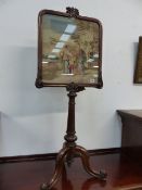 AN EARLY VICTORIAN ROSEWOOD POLE SCREEN WITH NEEDLEPOINT PANEL.