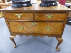 AN 18th.C.AND LATER OAK AND WALNUT LOWBOY WITH TWO SHORT AND ONE DEEP DRAWER STANDING ON CABRIOLE