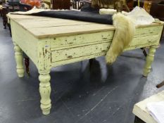 AN UNUSUAL LARGE PAIR OF PINE SCULLERY OR PREP TABLES EACH WITH SCRUBBED PINE TOP AND FOUR DRAWERS