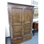 A LARGE 18th.C.AND LATER PANEL DOOR HALL CABINET. W.124 x H.192cms.