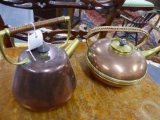 TWO ARTS AND CRAFTS COPPER AND BRASS KETTLES.