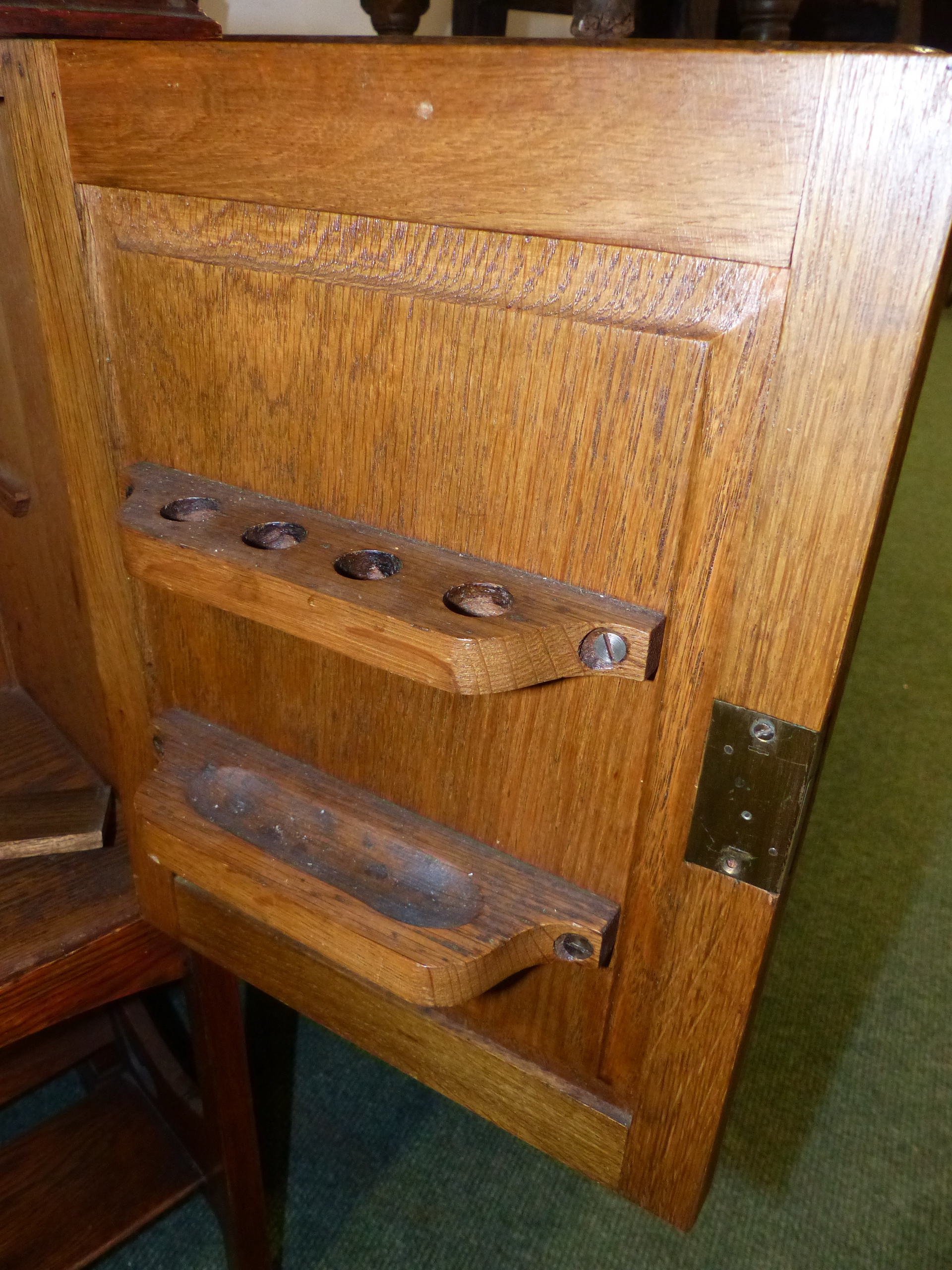 AN ARTS AND CRAFTS SMALL OAK SMOKER'S CABINET WITH BOOK TROUGH BELOW. - Image 12 of 15