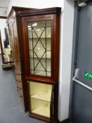 AN EDWARDIAN MAHOGANY GEORGIAN STYLE FLOOR STANDING CORNER CABINET. H.198 x W.69cms.