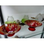 A PAIR OF CONTINENTAL RUBY GLASS FOOTED BOWLS WITH GILT AND POLYCHROME FLORAL AND FIGURAL DECORATION