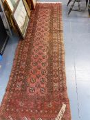 THREE SIMILAR AFGHAN BOKHARA RUNNERS. 290 x 76cms, 270 x 80cms AND 265 x 80cms.