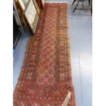 THREE SIMILAR AFGHAN BOKHARA RUNNERS. 290 x 76cms, 270 x 80cms AND 265 x 80cms.