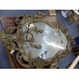 AN ANTIQUE LARGE FRENCH GILT ROCOCCO STYLE SEVEN LIGHT GIRONDOLE MIRROR WITH SHAPED PLATE FRAMED