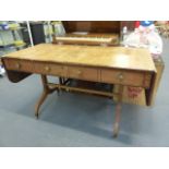 AN ANTIQUE INLAID BIRDSEYE MAPLE SOFA TABLE OF REGENCY DESIGN